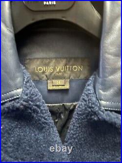 Blouson en cuir bleu Louis Vuitton taille 36, authentifié facture à l'appui